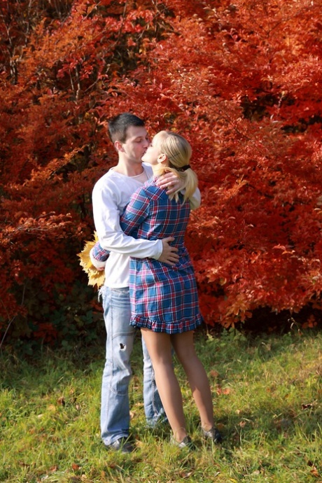 Blonde teen and her boyfriend enjoy an autumn day before sex in a cabin