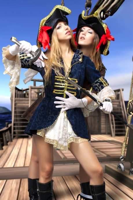 Female pirates partake in lesbian foreplay while on board a vessel