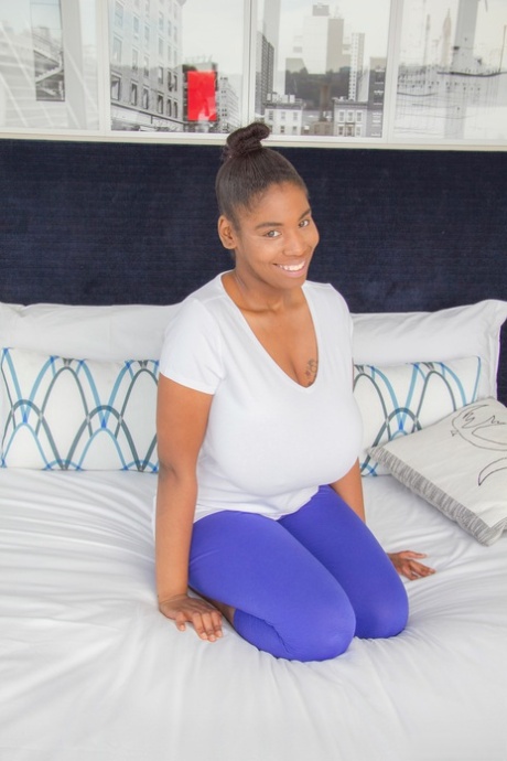 Thick black chick unleashes her huge saggy boobs in her underwear