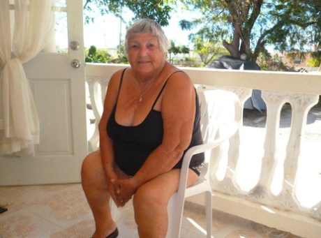 Fat oma Grandma Libby gets completely naked on a balcony by herself