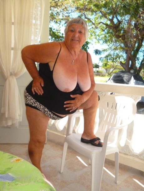 Fat oma Grandma Libby gets completely naked on a balcony by herself