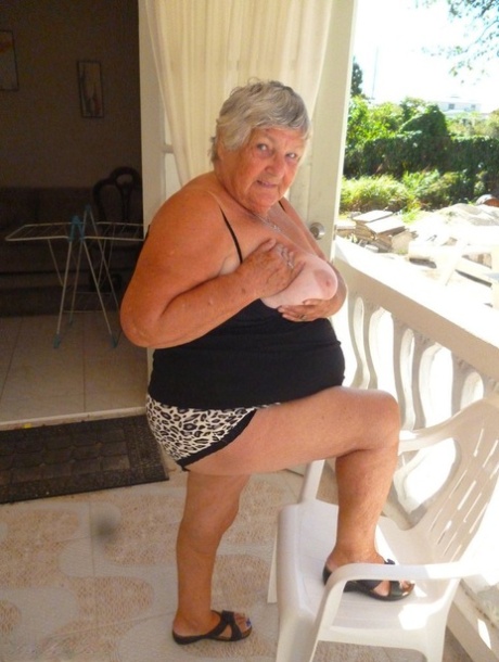 Fat oma Grandma Libby gets completely naked on a balcony by herself