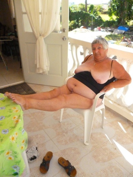 Fat oma Grandma Libby gets completely naked on a balcony by herself