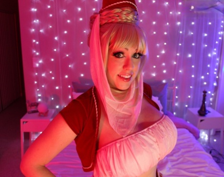 Busty amateur Kayla Kiss strips off her I Dream of Jeannie outfit in bedroom