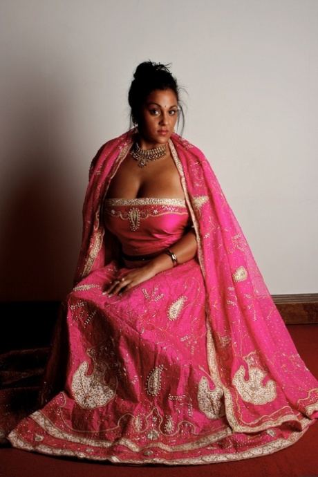 Indian female Keira unveils her big natural tits in bikini bottoms