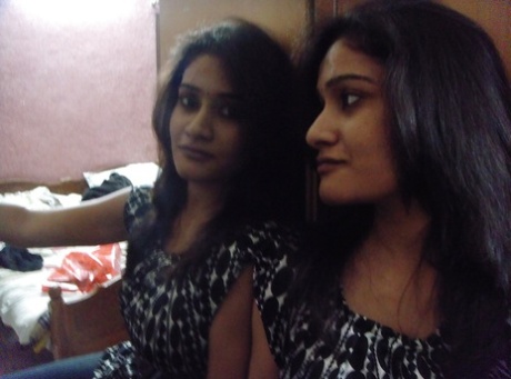 Indian solo girl sucks on the nipples of her big naturals during self shots