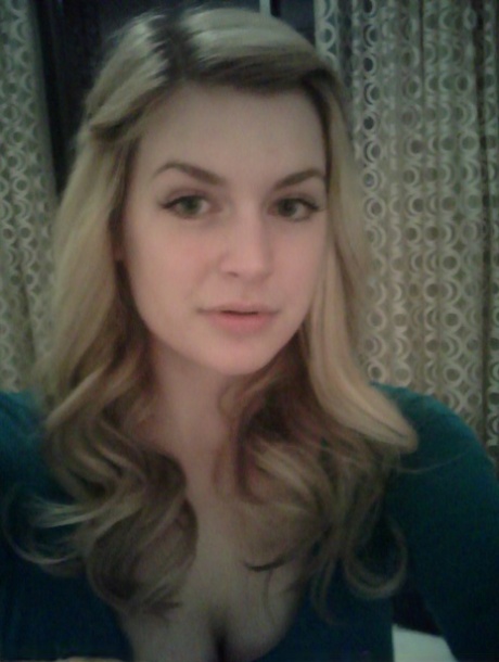 Blonde girl takes non nude selfies in various places around her house