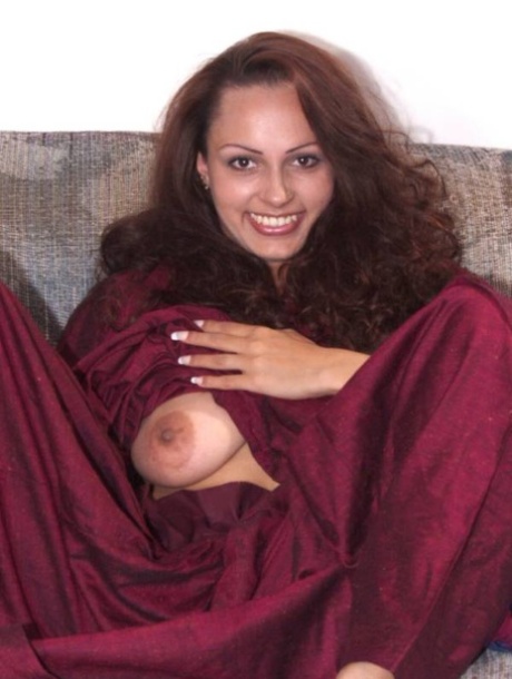 Indian solo girl gets completely naked upon a chesterfield