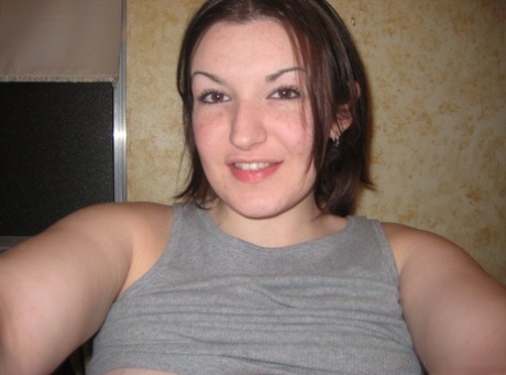 Big titted amateur takes safe for work selfies in a mirror