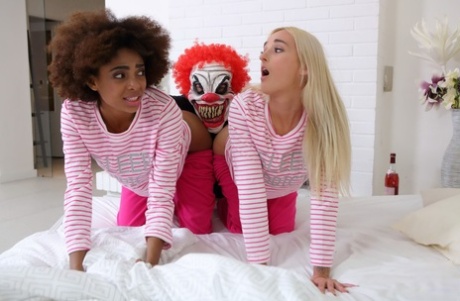 Luna Corazon & Daisy have threesome sex with a guy wearing a clown mask