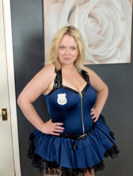 Thick amateur shows her large boobs during upskirt action in a ruffled skirt