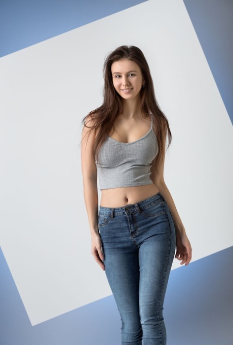 Beautiful teen Alisa I sets her great body free of clothing during solo action