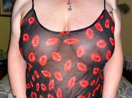 Older lady Busty Bliss uncovers her natural tits during POV action