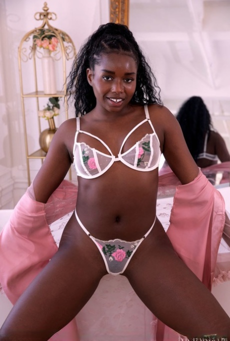 Hot black teen Dakota Simone gets totally naked in order to bathe