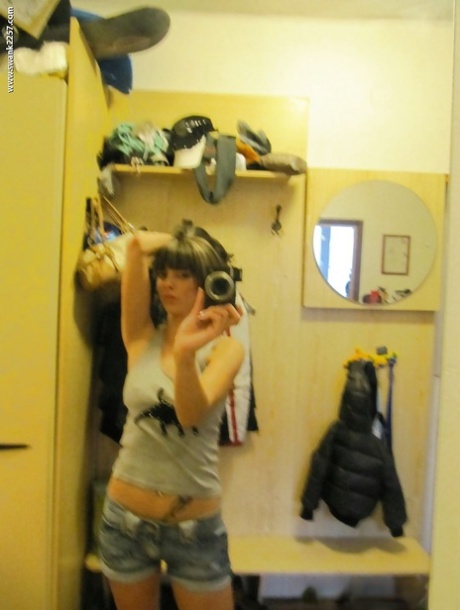 Sweet girlfriend Mellie gets some naked self shots in the mirror