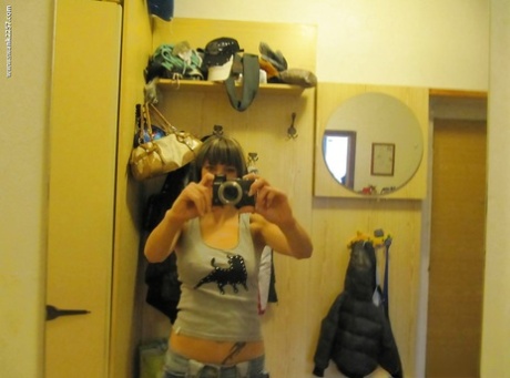 Sweet girlfriend Mellie gets some naked self shots in the mirror
