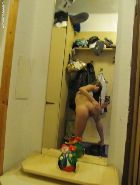 Sweet girlfriend Mellie gets some naked self shots in the mirror