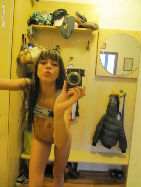 Sweet girlfriend Mellie gets some naked self shots in the mirror