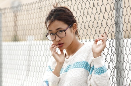 Adorable Asian babe Saki Kishima showcasing her amazing curves outdoors