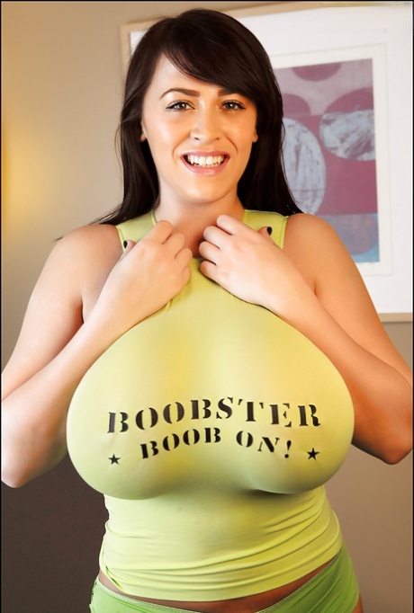Beautiful brunette babe Leanne Crow showing off her huge boobs
