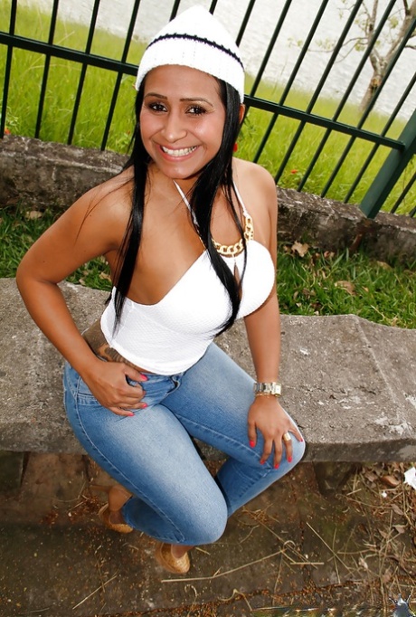 Buxom Brazilian MILF Alessandra Marques letting nice melons loose