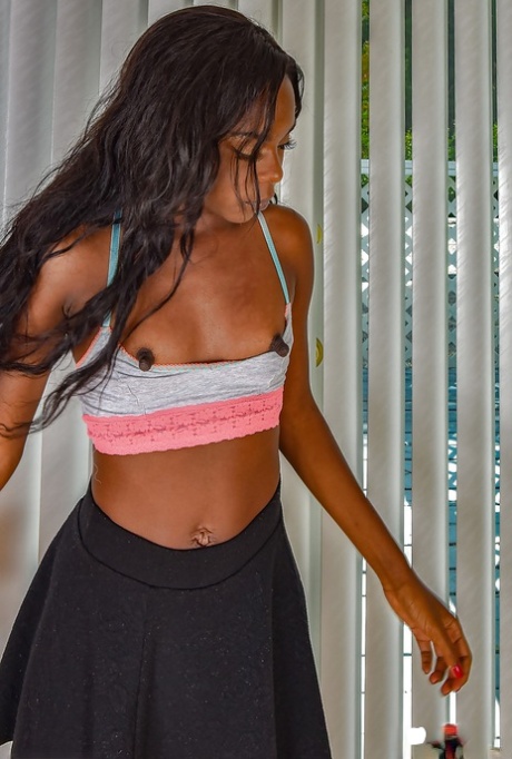 Ebony dime with phat ass unleashing tiny MILF tits and puffy nipples