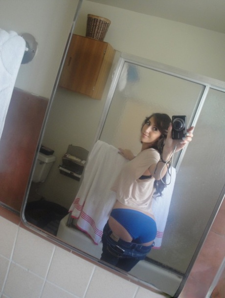 Latina ten April O'Neil whips out her big tits for selfies