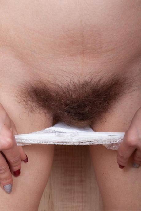 Slender teen Baby Boom unveils her saggy boobs and flaunts her bushy beaver