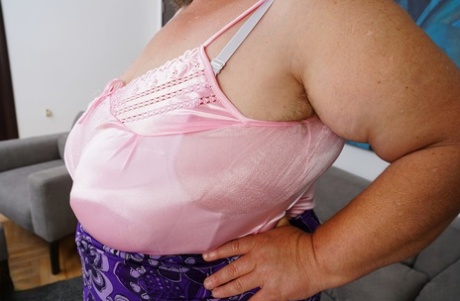 Chubby granny Jana shows her hairy pits while posing seductively