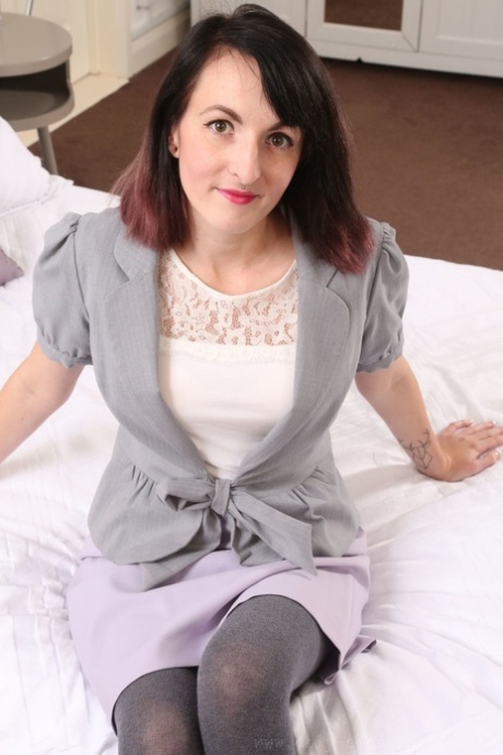 Horny wife Becca drops her skirt and teases with saggy tits in grey pantyhose