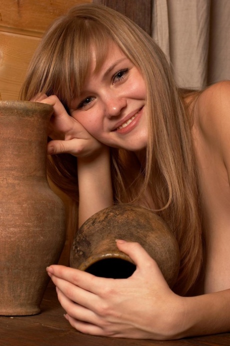 Erotic buxom teen Svanhild poses naked to show her perfect big tits & nipples