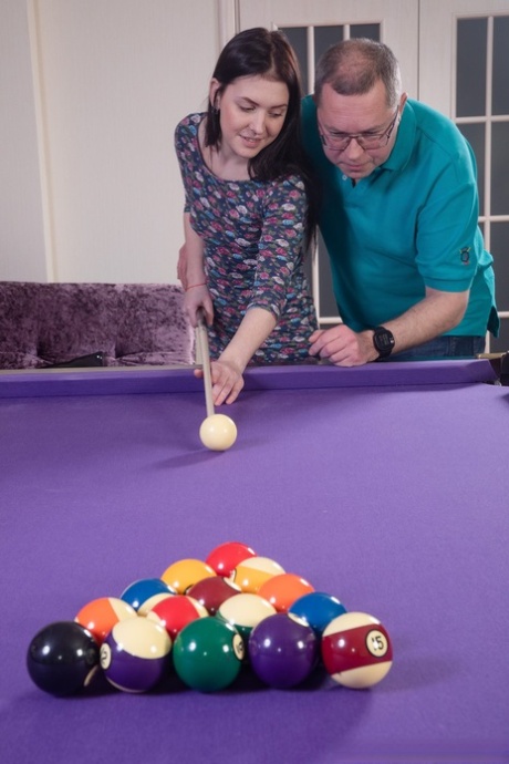 Young vixen Ellie gets seduced & fucked by a nerdy old man while playing pool