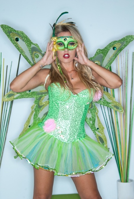 Sexy green fairy Capri Cavanni loses her panties & shows her bald pussy
