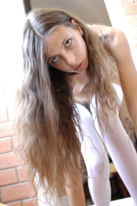 Sweet skinny teen Tamara D shows her hairy pussy and hot ass in stockings