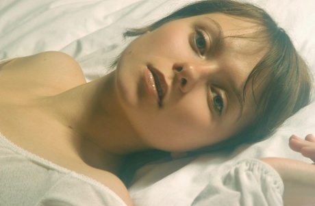 Sweet teen with tiny titties Anna S reveals her body and poses in a solo