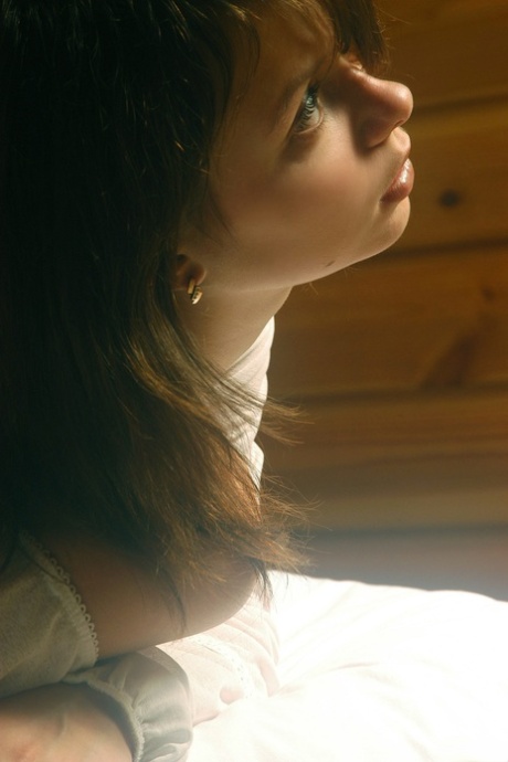 Sweet teen with tiny titties Anna S reveals her body and poses in a solo
