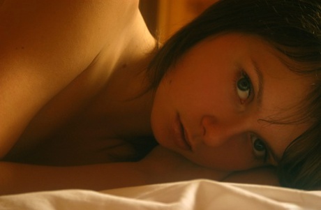 Sweet teen with tiny titties Anna S reveals her body and poses in a solo