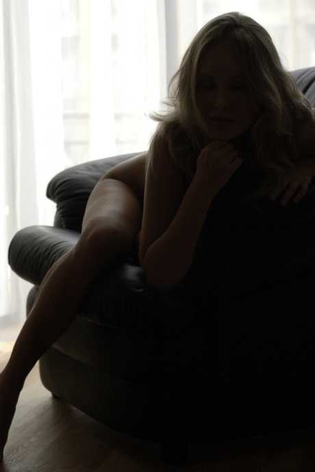 Beautiful blonde Koika shows off her shaved pussy & her puffy nipples