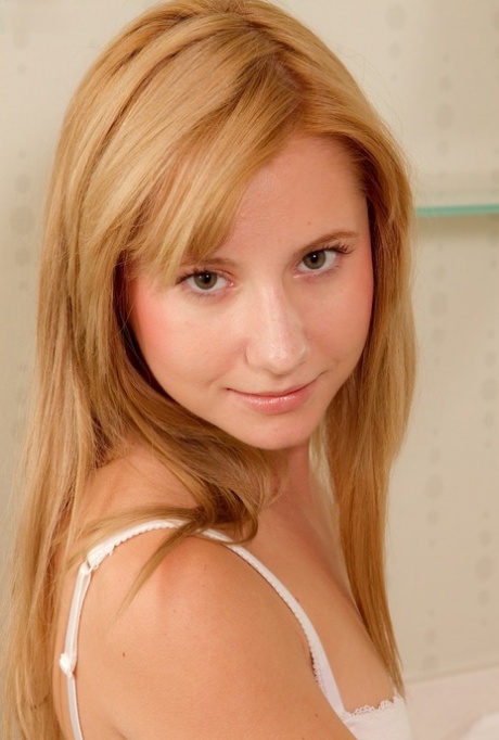 Beautiful teen Odette shows her small tits & her lickable shaved pussy