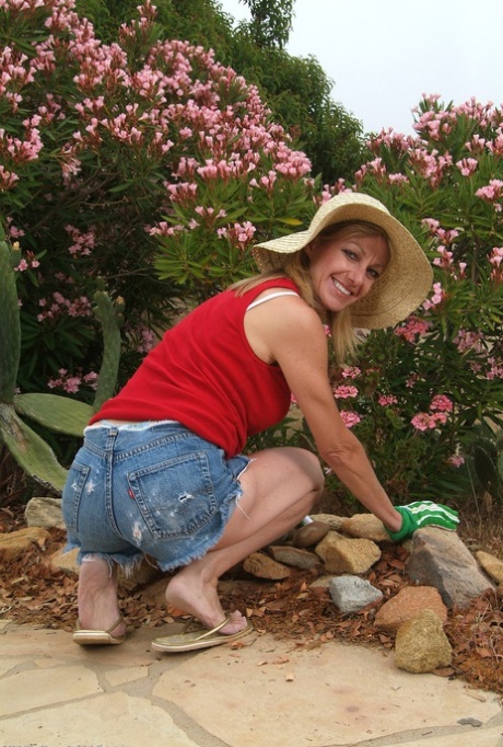 Hot skinny mature gardener Marlee exposes her hot boobs and spreads her legs