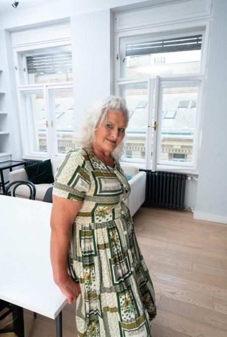 Granny with grey hair Juliene strips her dress and cuddles with a hot guy