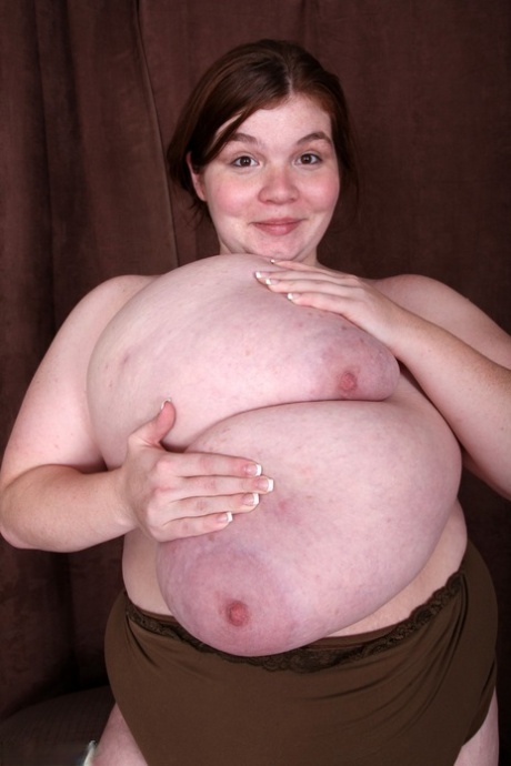 Amateur BBW Lexxxi Luxe lets out her giant breasts and plays with them