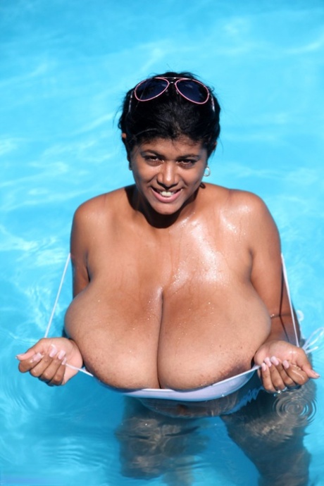 Fatty Puerto Rican MILF Kristina Milan unleashes and oils up her giant tits