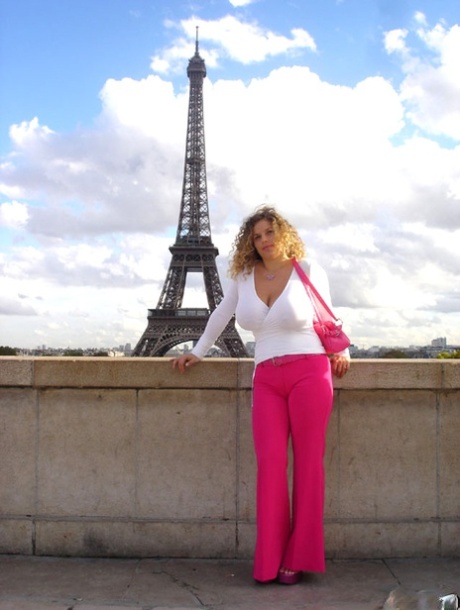 Curly haired babe Angel Crisa exposes her mesmerizing tits and poses in public