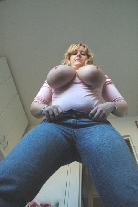Bored housewife Davina unveils her monster melons and plays with them