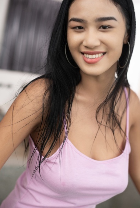 Alluring teen Kahlisa giving inviting up-close views of her hairy snatch