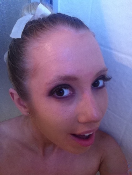 30yo pornstar Nicki Blue takes sexy selfies of her tiny tits & swollen muff