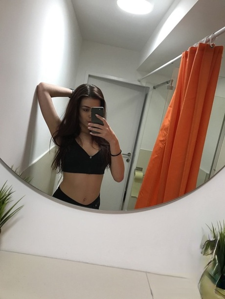 Russian teen Emily Mayers showing her great ass while taking nude selfies