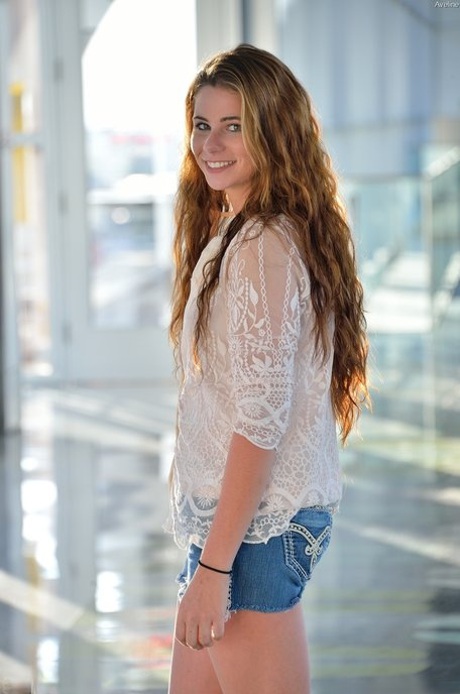Cute teen Aveline reveals her asshole and pierced nipples in public transport