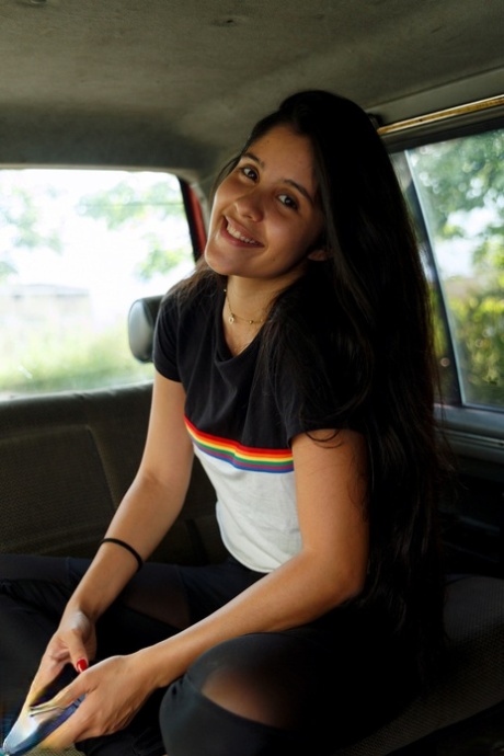 Pretty amateur Katie Arias shows her tiny tits & her big ass while hitchhiking